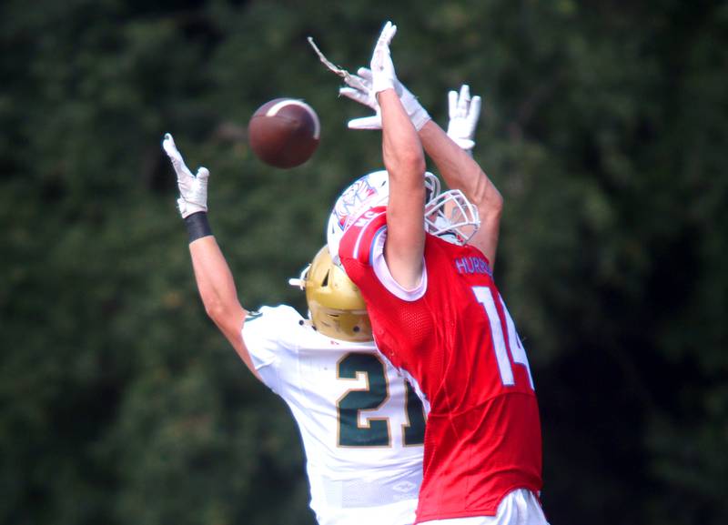 Marian Central’s Wilson Jakubowicz leaps for a pass against Bishop McNamara in varsity football action on Saturday, Sept. 14, 2024, at George Harding Field on the campus of Marian Central High School in Woodstock.