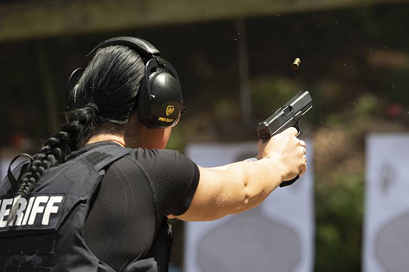 A Sauk Valley Police Academy recruit fires a round during training Wednesday, July 17, 2024.