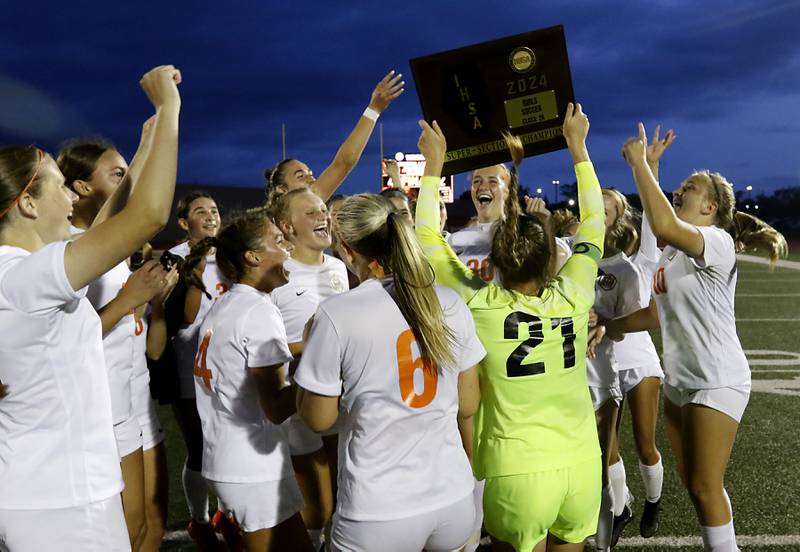 Crystal Lake Central players shebrate their 4-2 win over St. Ignatius College Prep in the Class 2A Deerfield Supersectional girls soccer match on Tuesday, May 28, 2024, at Deerfield High School.