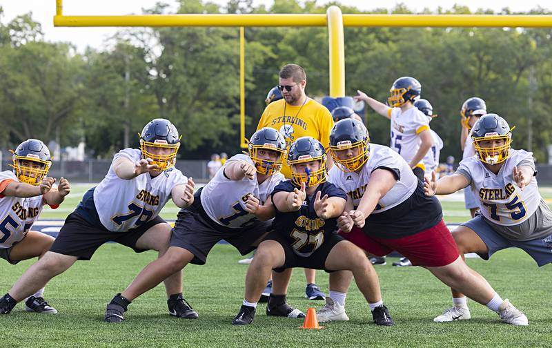 Sterling lineman practice goal line blocking Tuesday, Aug. 13, 2024 at Sterling High School.