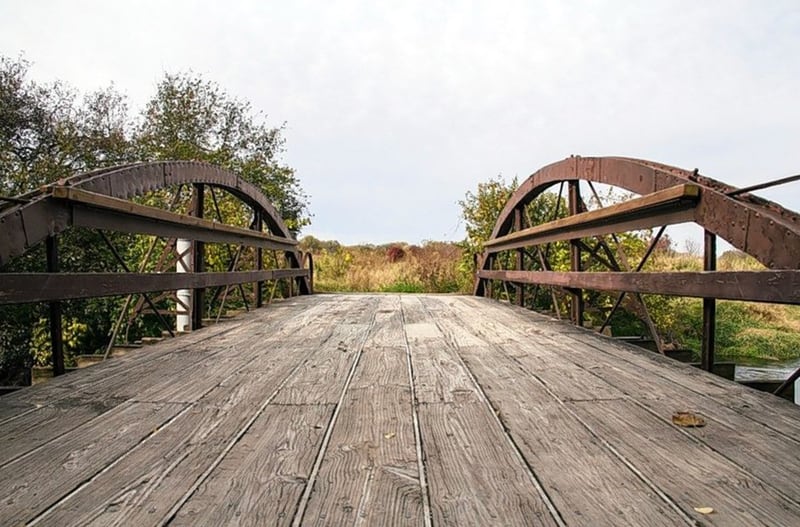 A wrought-iron bowstring pony truss bridge is being refurbished and will return in October to Hidden Lake Forest Preserve near Downers Grove. (Courtesy of Forest Preserve District of DuPage County)
