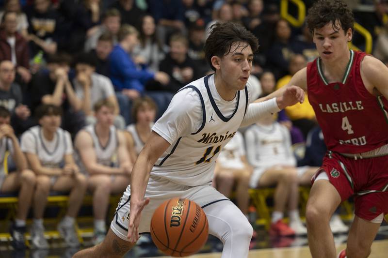 Sterling’s Nico Battaglia drives to the hoop against LaSalle-Peru Friday, Feb. 23, 2024 during a class 3A regional final at Sterling High School.