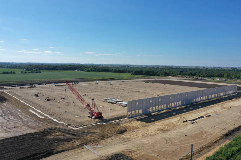 An exterior wall is being constructed at Ollie's Bargain Outlet warehouse distribution center in Princeton.