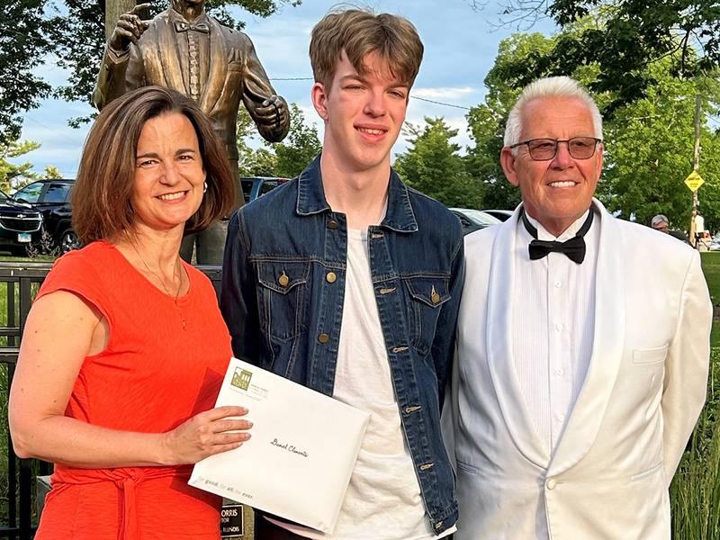 (Left to right); DeKalb County Community Foundation grants and scholarship manager Sara Nickels, Daniel Clements, and DeKalb Municipal Band conductor Kirk Lundbeck