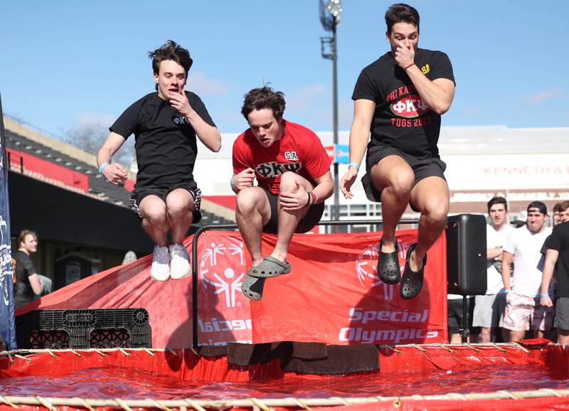 Members of the Phi Kappa Psi fraternity cannonball into the water on a cold and windy Saturday, Feb 17, 2024, during the Huskie Stadium Polar Plunge at Northern Illinois University in DeKalb. The Polar Plunge is the signature fundraiser for Special Olympics Illinois.