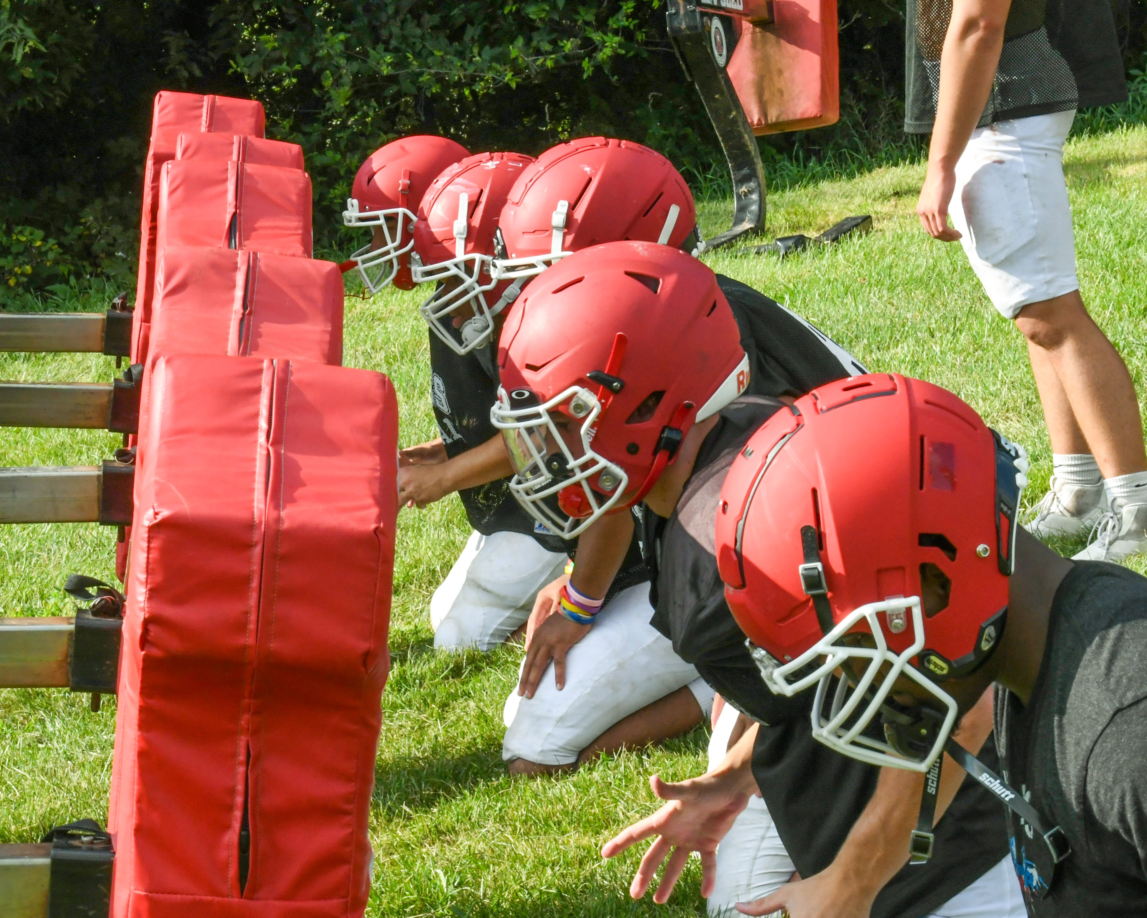 Yorkville football players get set to work on hitting drills during practice Monday Aug. 19, 2024,  held at Yorkville High School.