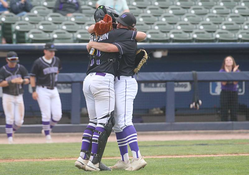 Wilmington's Cade McCubbin hugs teammate Kyle Farrell after winning the Class 2A third place game on Saturday, June 1, 2024 at Dozer Park in Peoria.