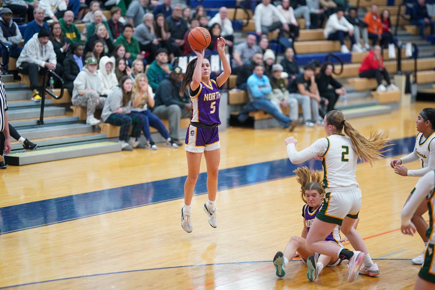 Downers Grove North's Campbell Thulin (5) shoots a three pointer against Waubonsie Valley during a Oswego semifinal sectional 4A basketball game at Oswego High School on Tuesday, Feb 20, 2024.