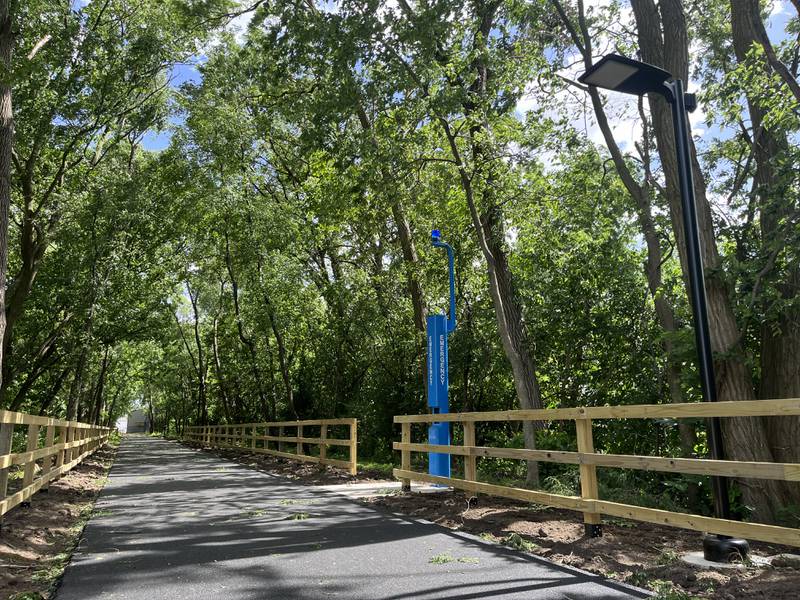 The city of Dixon had emergency poles installed earlier this week along the newly paved Illinois Transportation Enhancement Program multi-use path that runs west along the river with a ramp to the viaducts running to Seventh Street.