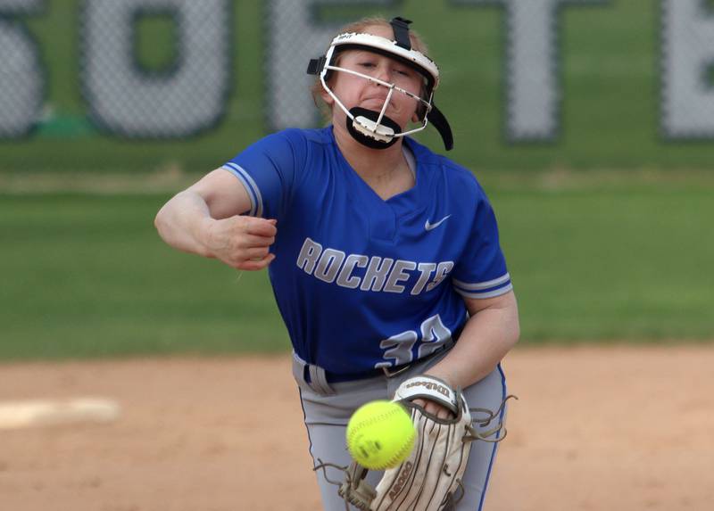 Burlington Central’s Allie Botkin delivers in varsity softball at Cary Monday.