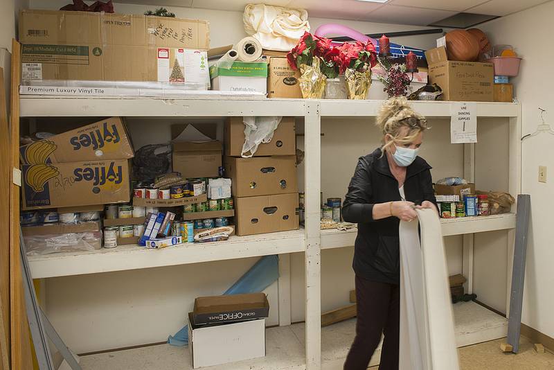 Whiteside County Senior Center assistant director Beth Sterk works to renovate a utility closet into the center’s food pantry. The pantry is currently located outside of the main building and is inconvenient to stock and distribute. The pantry is just one of several projects the center is undergoing.