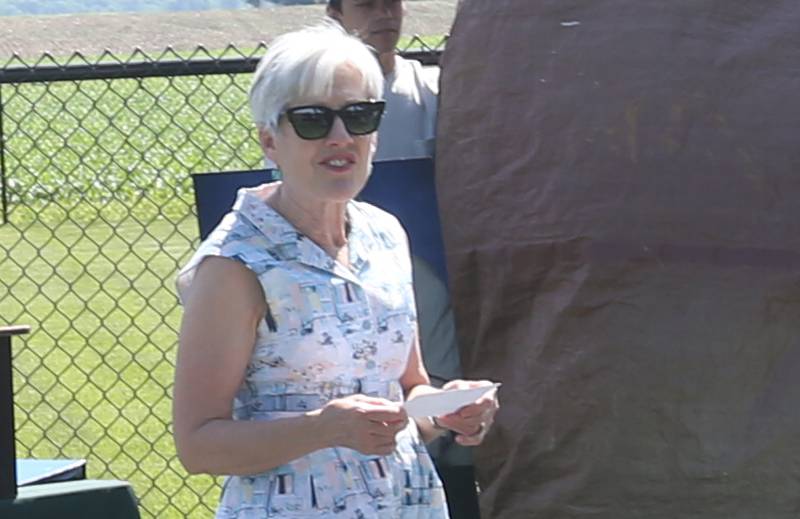 Jan English daughter of Jeanne Hutchinson, delivers a speech during the opening of a new a new dog park on Thursday, May 23, 2024 at Zearing Park in Princeton. The one acre park has duel sections for small and large dogs, benches, a dog water fountain and waste station. Jeanne Hutchinson has donated the funds to the Princeton Park District to fund the building of the dog park and to generate income to help maintain its care.