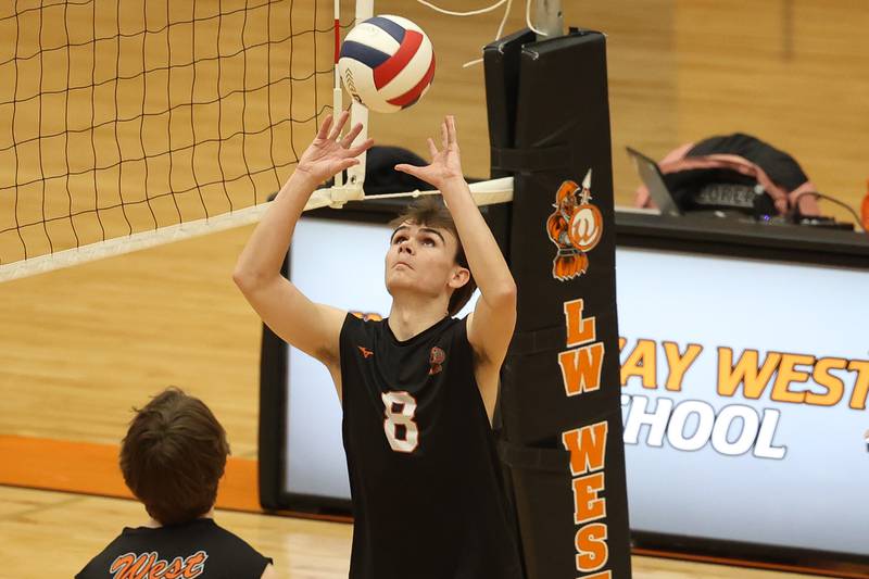 Lincoln-Way West’s Noah Konopack sets the ball against Providence on Wednesday, April 3, 2024 in New Lenox.