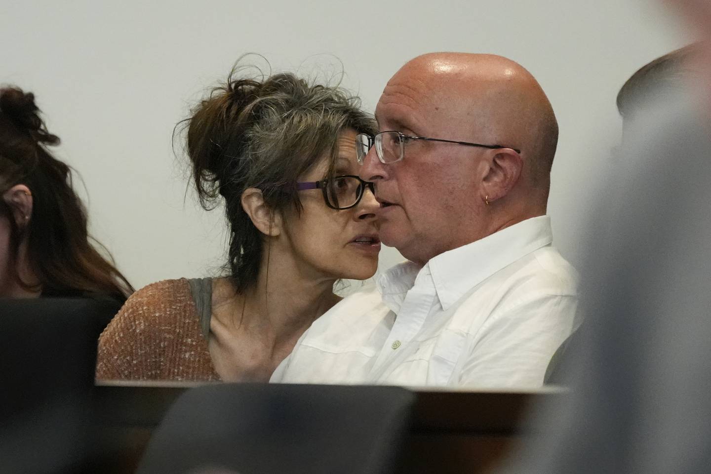 Robert E. Crimo III's mother Denise Pesina, left, and father Robert Crimo Jr. wait before their son appears Wednesday, June 26, 2024, before Judge Victoria A. Rossetti at the Lake County Courthouse in Waukegan. Crimo III is charged with killing seven people and wounding dozens more in a shooting at an Independence Day parade in the suburban Chicago town of Highland Park.