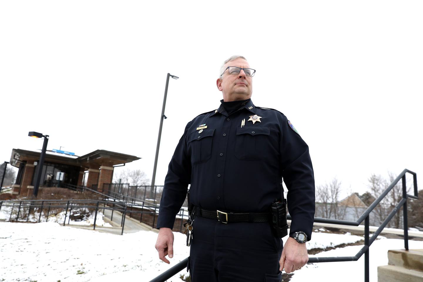 Elburn Police Chief Nick Sikora was the first officer on scene when the bus of 38 asylum seekers arrived at the Metra station Dec. 22, 2023. Thirty-two got on the train, while four were picked up by family.