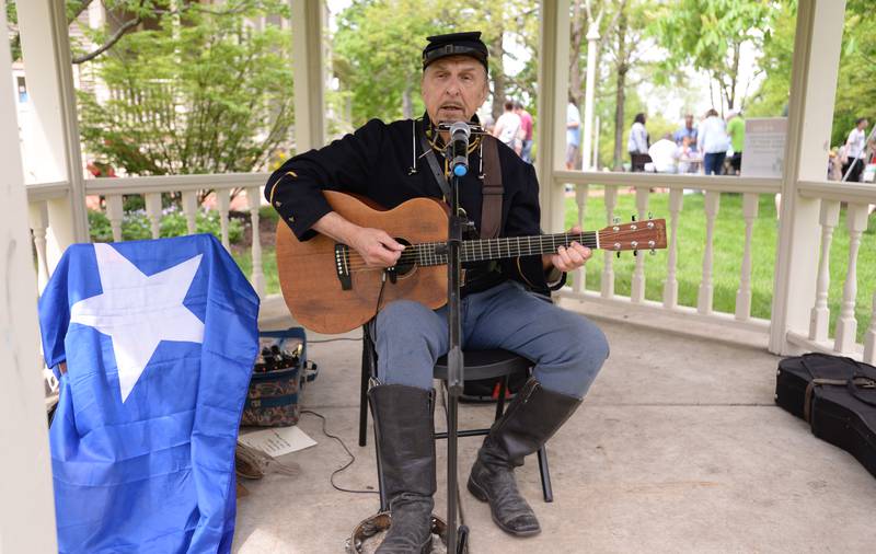 David Corbett sings songs of the Civil War during the Country in the Park event held at the Downers Grove Historical Museum as part of the Founders Day celebration Saturday May 4, 2024.