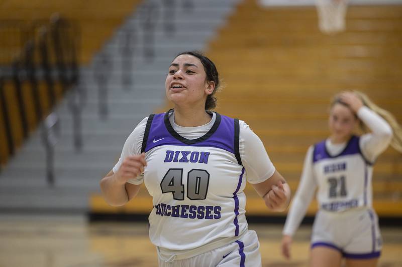 Dixon’s Hallie Williamson runs to celebrate with her classmates Tuesday, Feb. 13, 2024 during a regional semifinal at Rochelle.