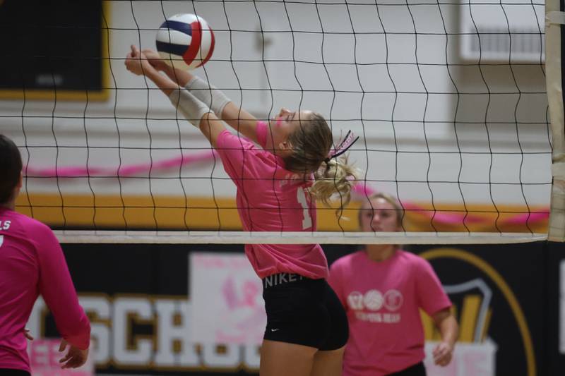 Joliet West’s Ava Grevengoed keeps the volley going against Joliet Central in the JTHS Pink Heals match. Tuesday, Oct. 4, 2022, in Joliet.
