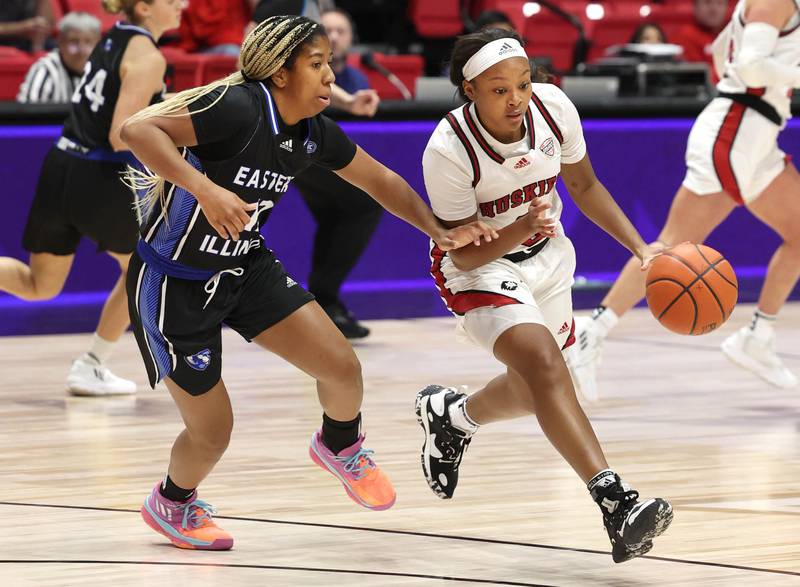 Northern Illinois' Jayden Marable tries to go around Eastern Illinois' Charita Lewis during their game Monday, Dec. 18, 2023, at the Convocation Center at NIU in DeKalb.