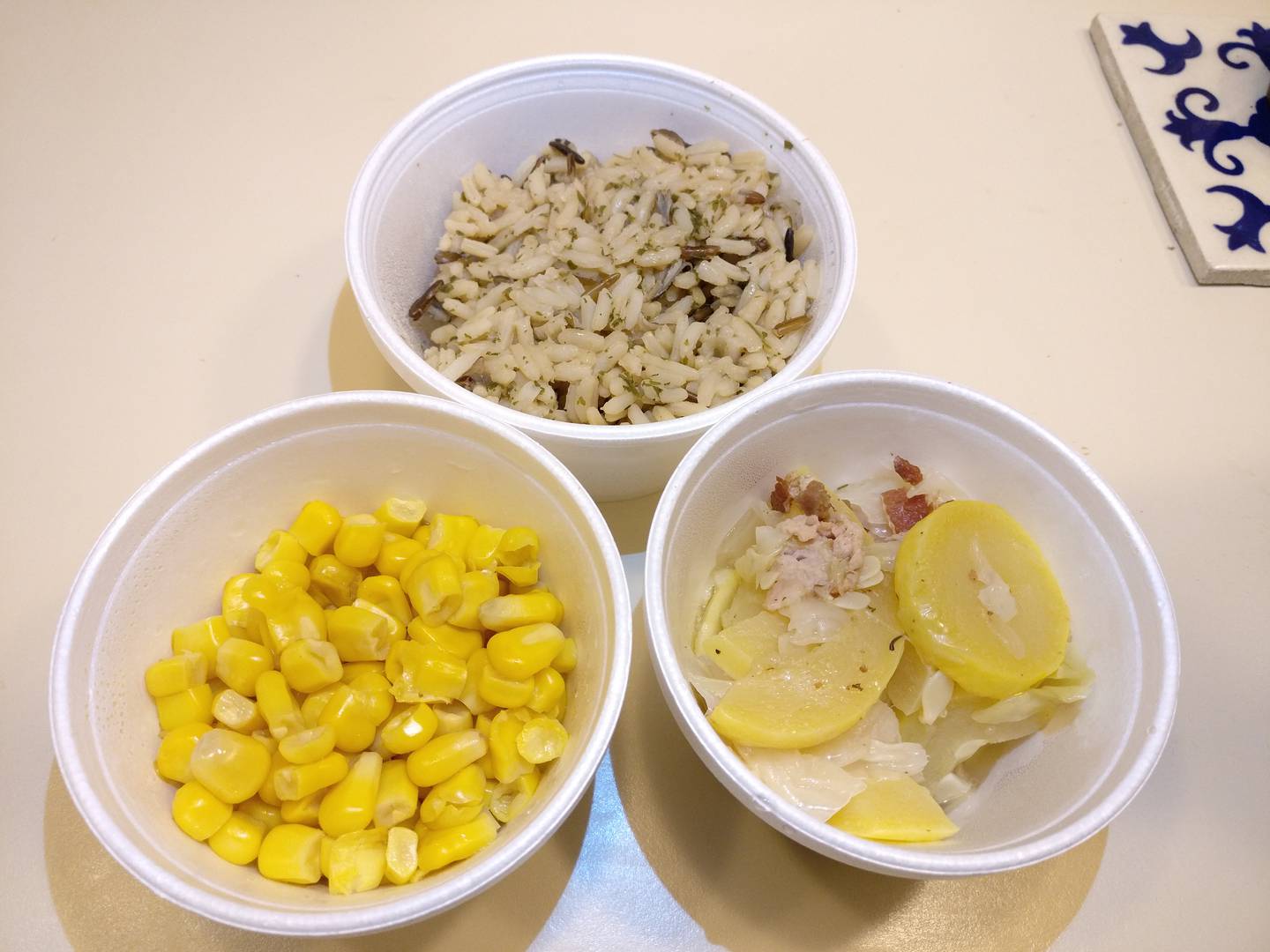 Sides of a wild rice blend, corn, and squash at Harner's Bakery & Restaurant in North Aurora.