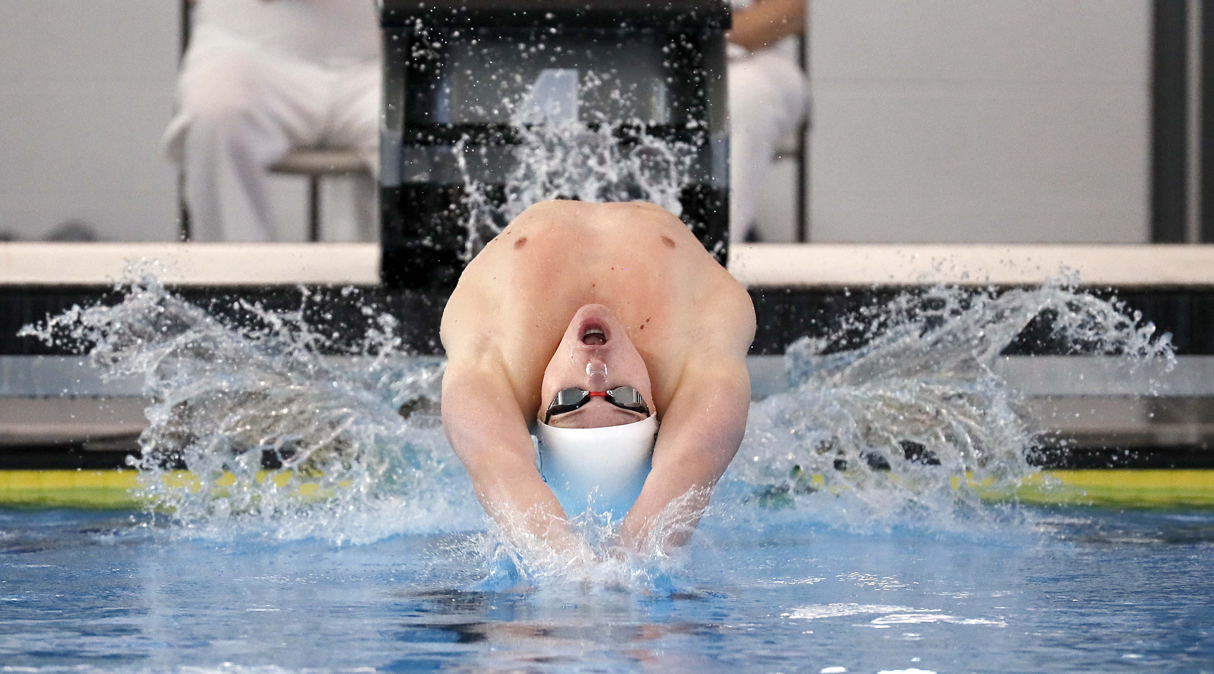 Brady Johnson of West Chicago competes in the Boys 100 Yard Backstroke during the IHSA Boys state swim finals Saturday February 25, 2023 in Westmont.