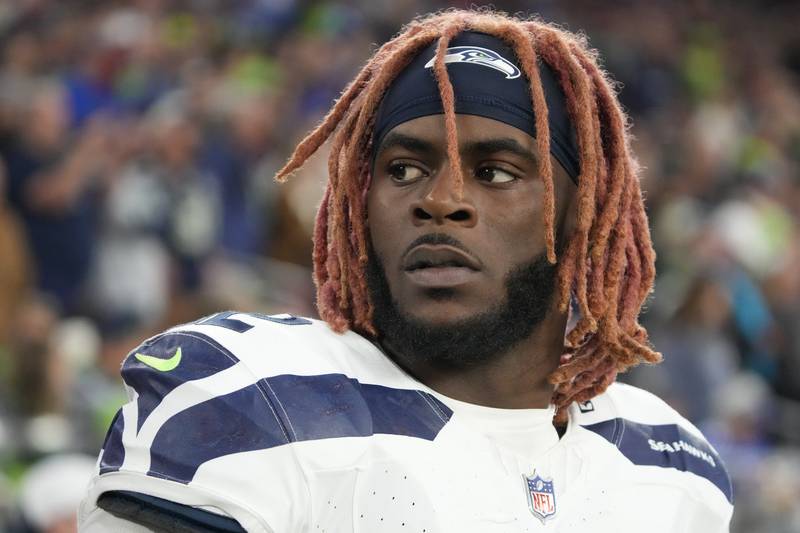 FILE - Seattle Seahawks linebacker Darrell Taylor (52) during the first half of an NFL football game against the Arizona Cardinals, Jan. 8, 2024, in Glendale, Ariz. (AP Photo/Rick Scuteri, File)