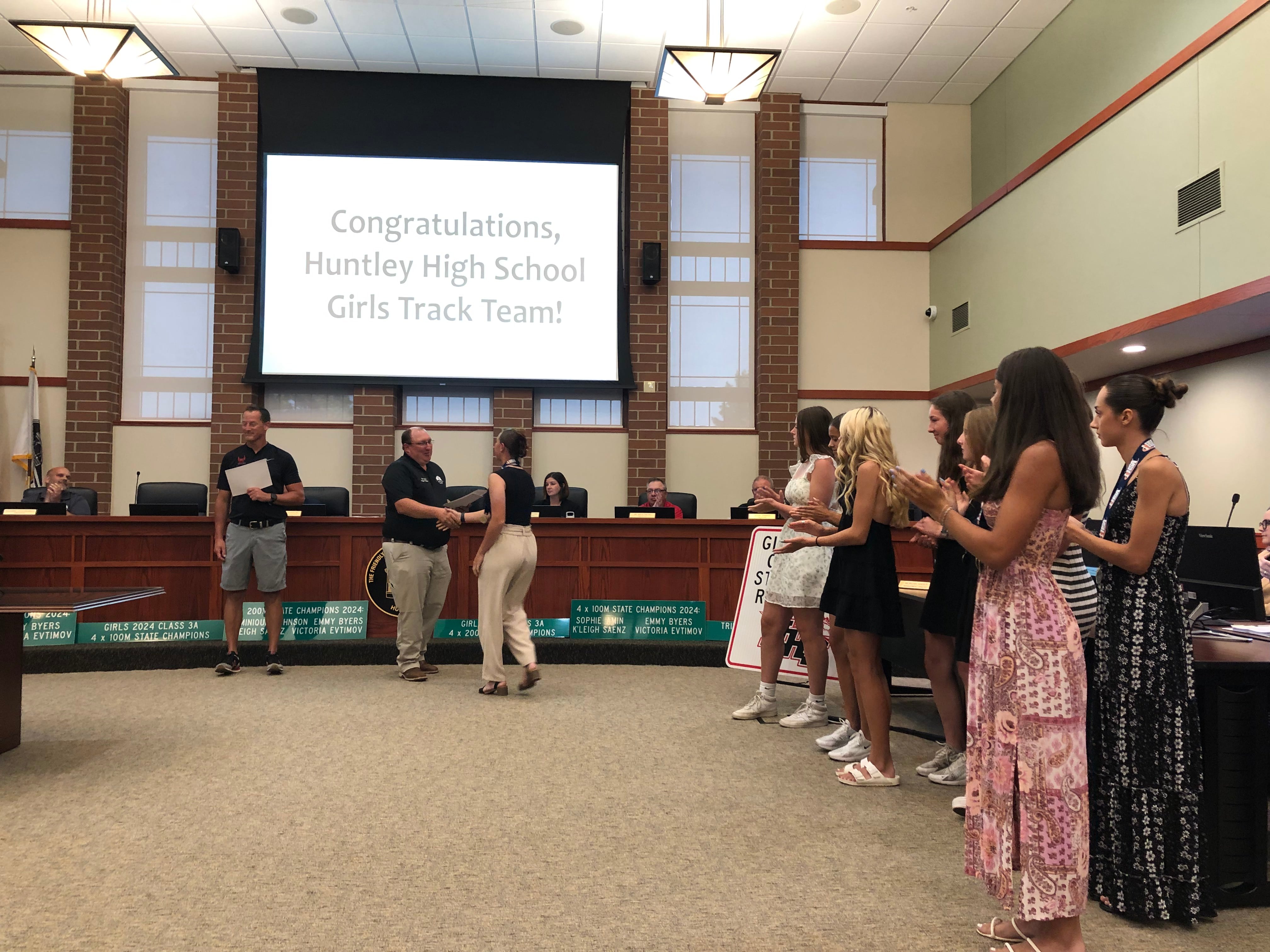 Huntley High girls track team honored by village