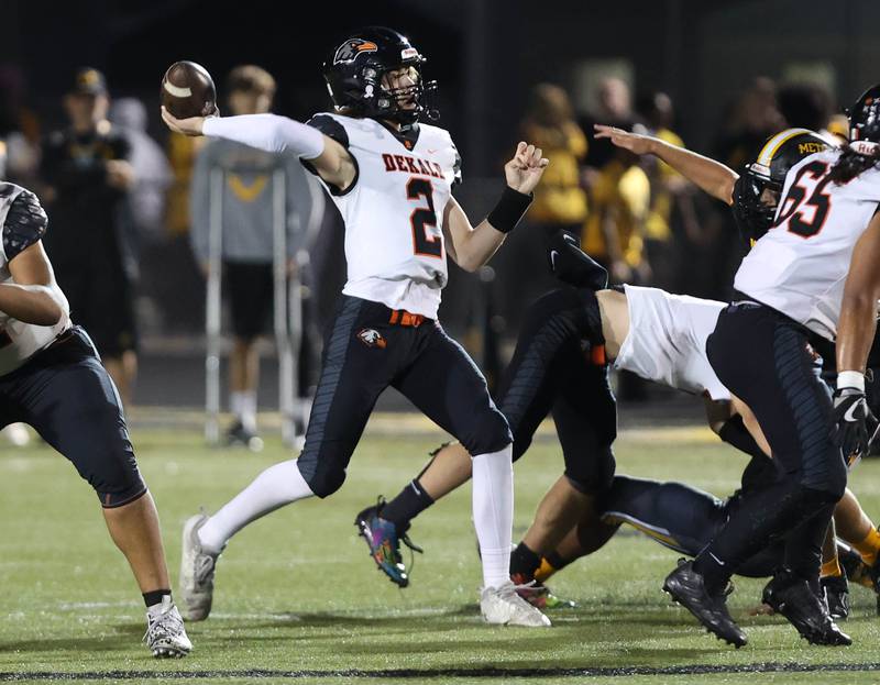 DeKalb's Cole Latimer lunches a pass downfield during their game Friday, Sept 15, 2023, at Metea Valley High School in Aurora.