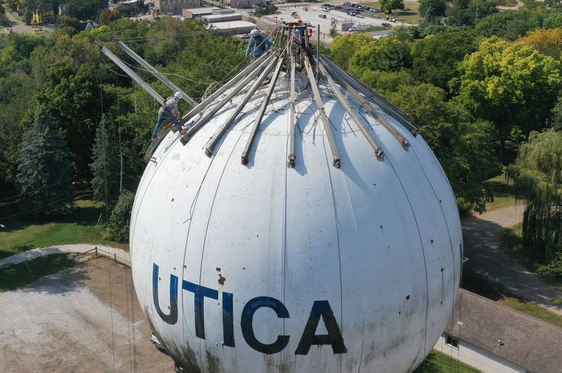 Crews are in the beginning stages of painting the Utica water towner on top of Clarks Hill on Wednesday, Sept. 18, 2024 in Utica. Crews will be doing repairs to the interior and exterior of the tower before painting. When finished, the tower will have a new logo on it. Crews are in the beginning stages of painting the Utica water towner on top of Clarks Hill on Wednesday, Sept. 18, 2024 in Utica. Crews will be doing repairs to the interior and exterior of the tower before painting. When finished, the tower will have a new logo on it.