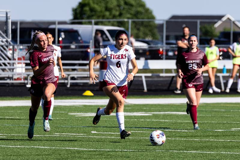 Plainfield North's Katelyn Haiser breaks away against Lockport during the Class 3A Sectional at Plainfield North on May 22, 2024.