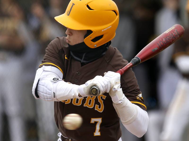 Jacobs's Keegan Connors looks for his pitch as the ball flies by during a Fox Valley Conference baseball game Friday, April 15, 2022, between Jacobs and McHenry at Petersen Park in McHenry.