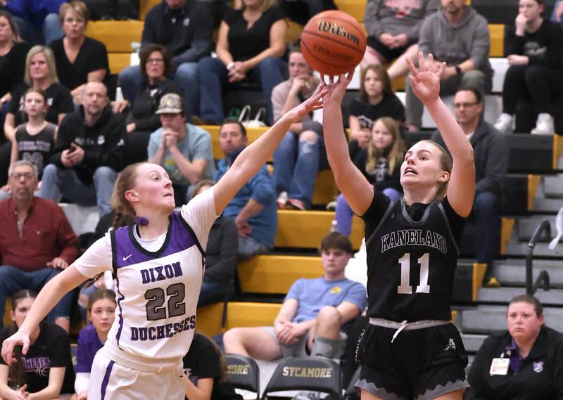 Kaneland's Berlyn Ruh gets up a shot in front of Dixon’s Katie Drew Thursday, Feb. 22, 2024, during their Class 3A sectional final game at Sycamore High School.