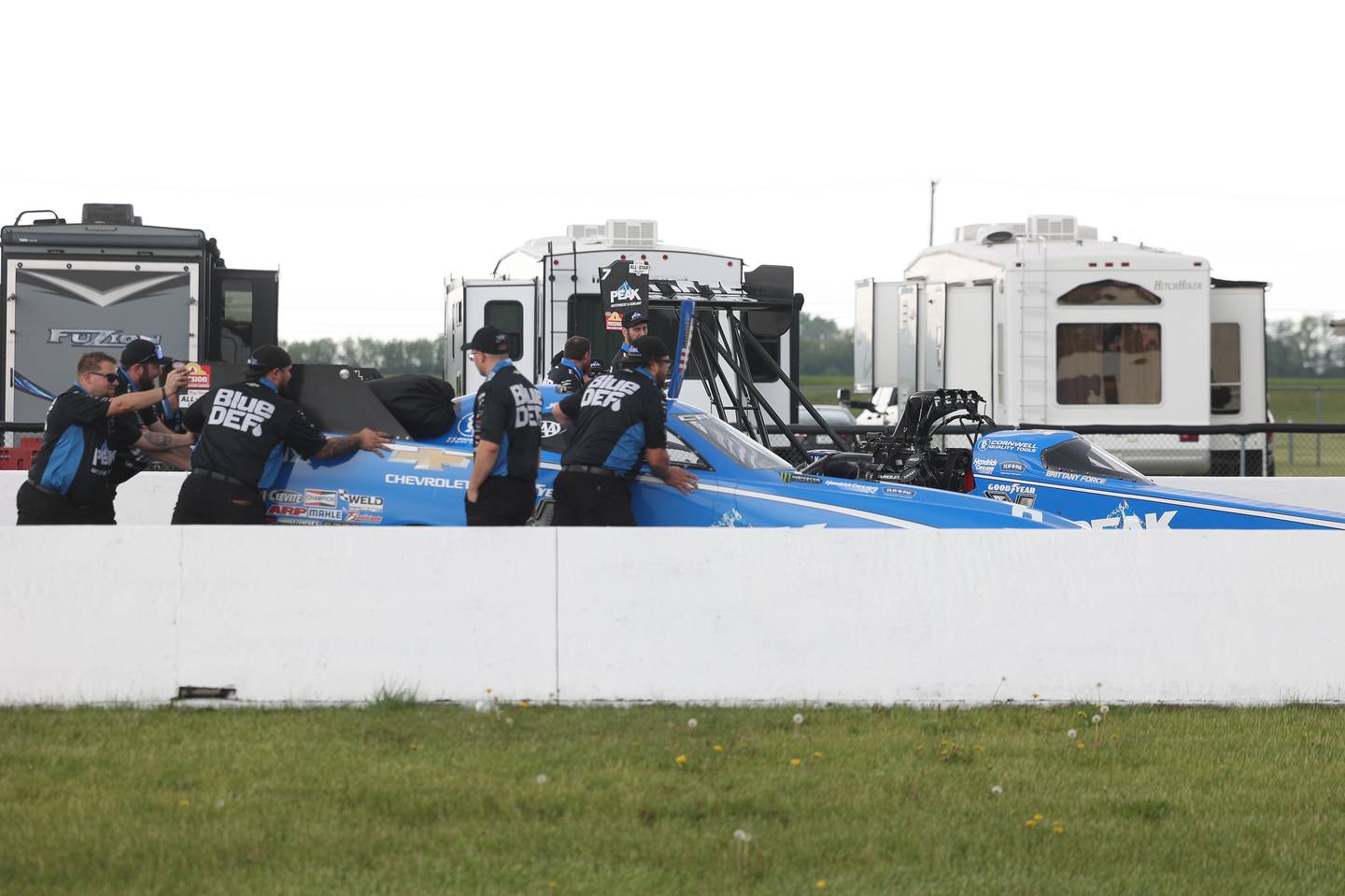 Team Blue DEF stages Brittney Force and her father John Force’s cars out on the track for a photo shoot in preparations for the NHRA Route 66 Nationals this weekend at Route 66 Raceway on Thursday, May 16, 2024 in Joliet.