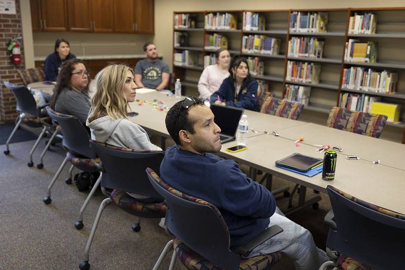 Sterling School’s paraprofessionals attend a meeting Friday, April 21, 2023. about SPS University, a program meant to fast track those who want to full time teachers.