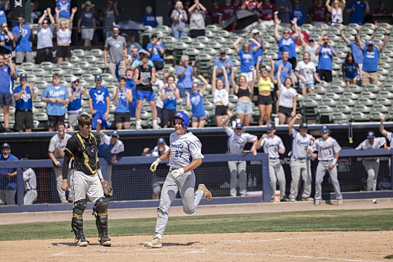 Newman’s Brendan Tunink crosses the plate for an inside the park home run against Goreville Saturday, June 3, 2023 during the IHSA class 1A third place baseball game.