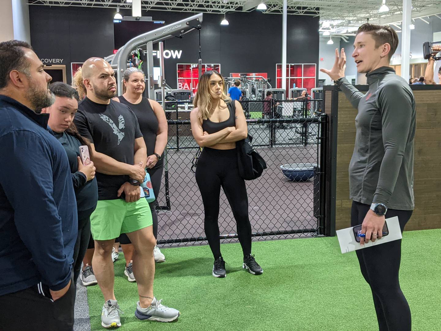 Gini Grimsley, director of fitness product for VASA Fitness, gives a tour of the newly opened VASA Fitness gym in Oswego on May 15.