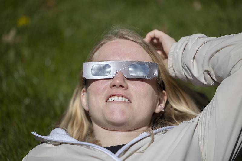 Emily Roth of Rock Falls kicks back to witness the star-studded event Monday, April 8, 2024 at Sauk Valley Community College.