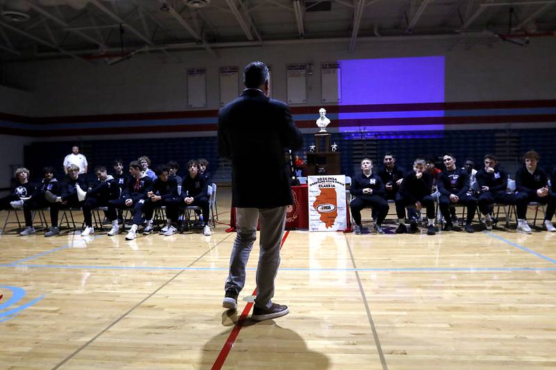 Woodstock Mayor Mike Turner talks to the team as Marina Central honors their wrestlers that brought home the IHSA Class 1A Dual Team State Championship title on Friday, March 8, 2024, during a celebration at the high school in Woodstock.