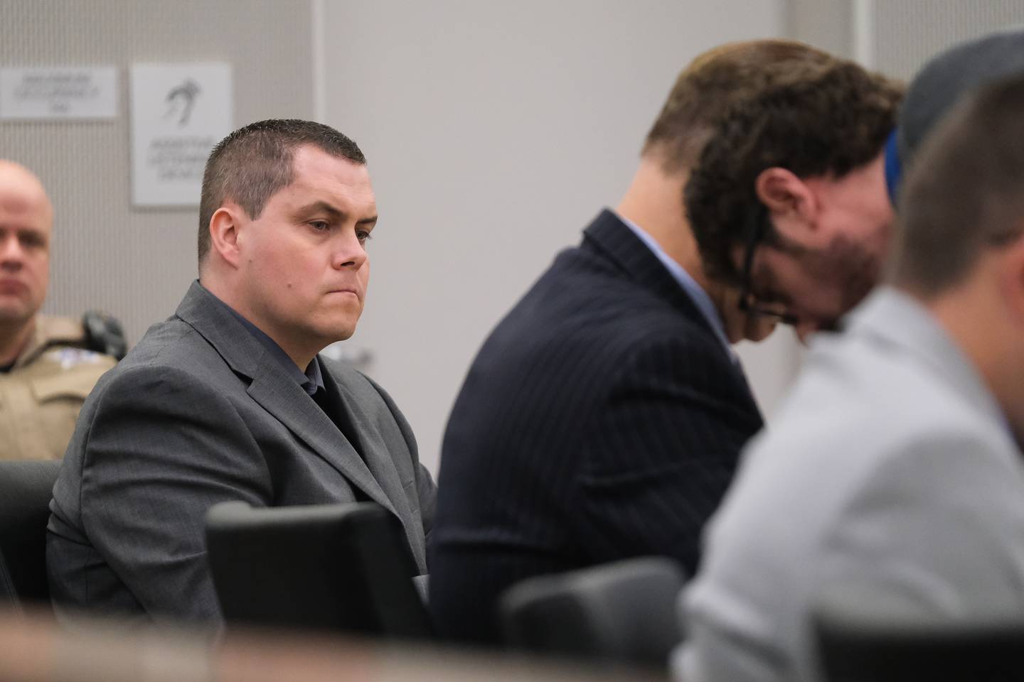 Jeremy Boshears, 36, watches as his lawyer Chuck Bretz converses with the prosecuting attorney Thomas Bahar. Boshears is charged with the murder of Kaitlyn “Katie” Kearns, 24, on Nov. 13, 2017. Monday, April 25, 2022, in Joliet.