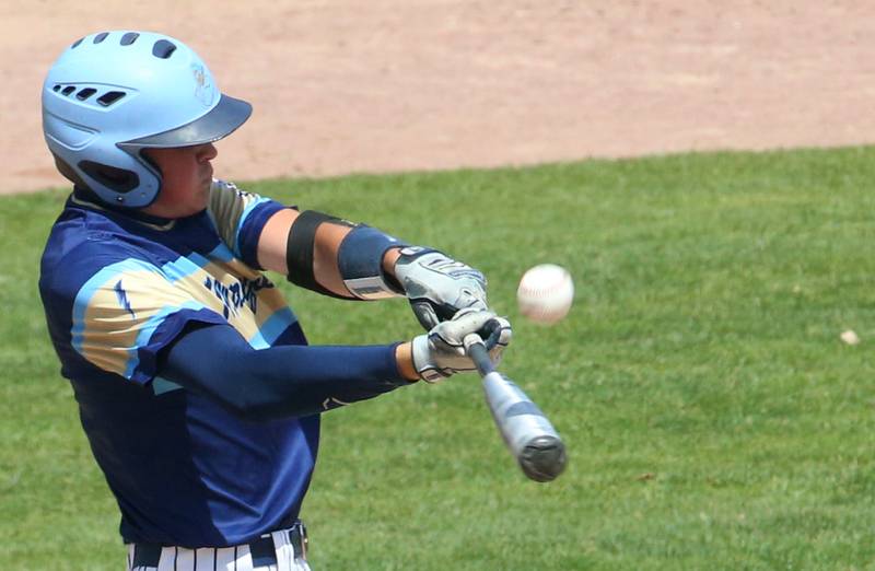 Marquette's Keaton Davis hits the ball against Routt during the Class 1A semifinal game on Friday, May 31, 2024 at Dozer Park in Peoria.