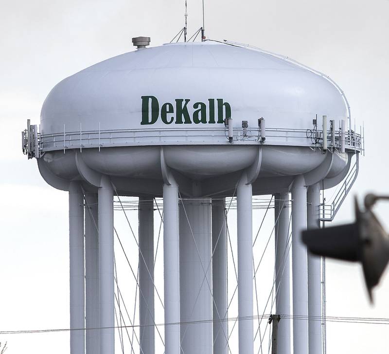 A DeKalb water tower stands in the distance on Thursday, March 2, 2017, in DeKalb.