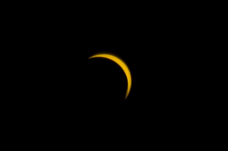 The moon nearly completely covers the sun Monday, April 8, 2024 as seen from northern Illinois. A path of totality cut a swath farther south in the state.