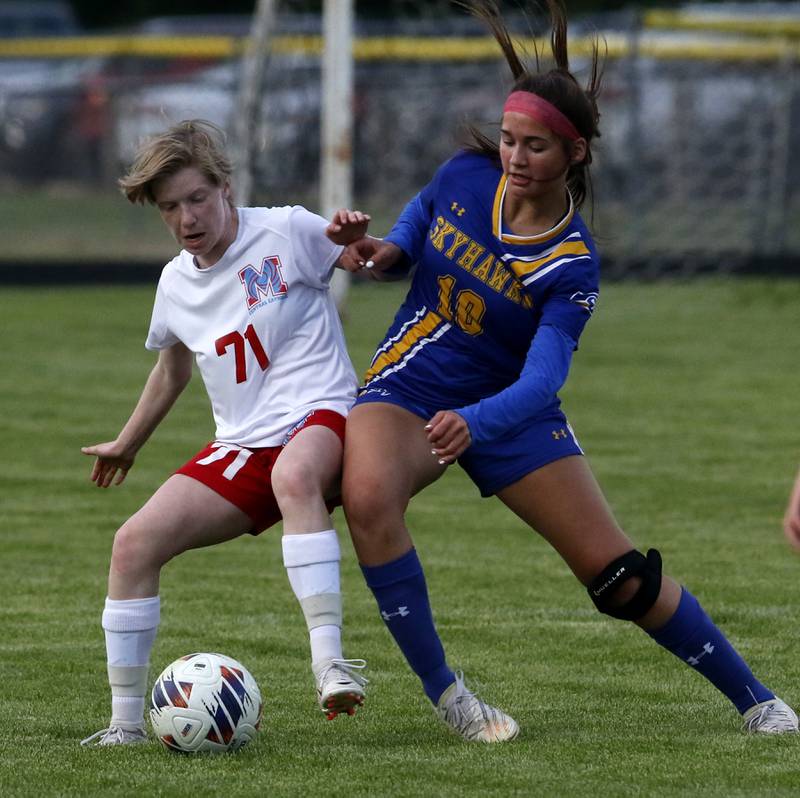 Marian Central'a Natalee Henkel battles with Johnsburg's London Baidinger for control of the ball during the IHSA Class 1A Marengo Regional championship soccer match on Tuesday, May 14, 2024, at Marengo High School.