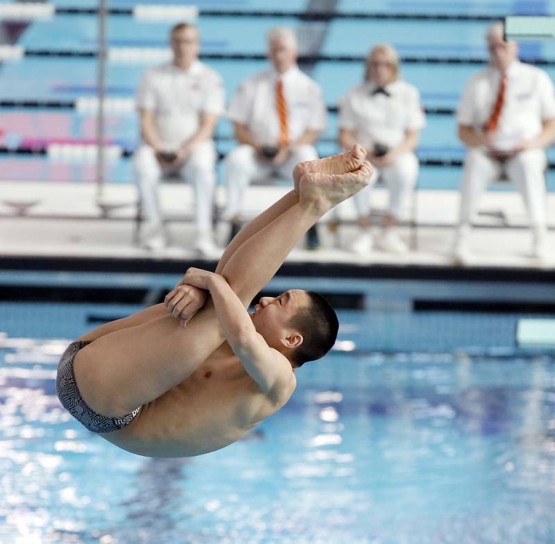 Matthew Yuan of Glenbrook North competes in the Boys 1 mtr Diving during the IHSA Boys state swim finals Saturday February 25, 2023 in Westmont.