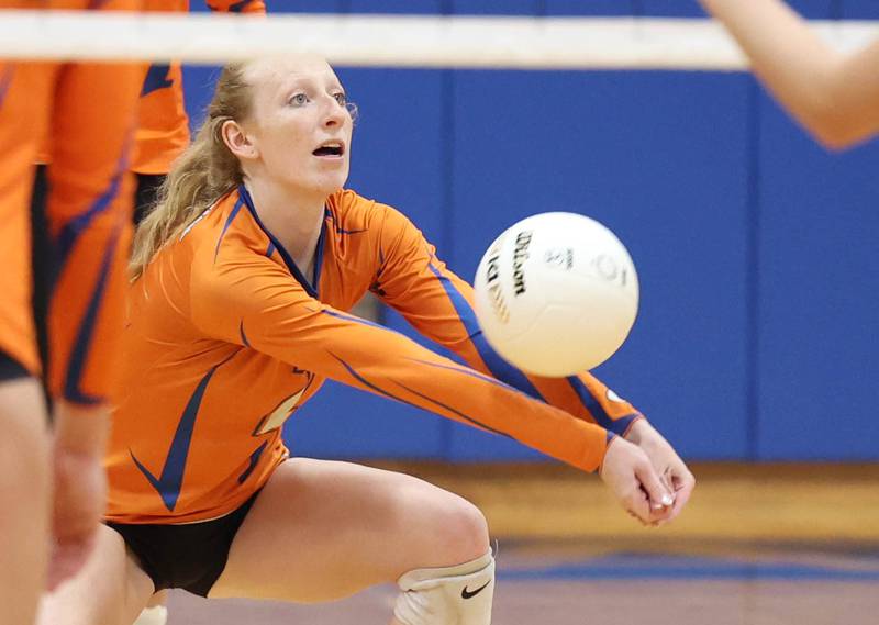 Genoa-Kingston's Kailey Kline digs a serve from Rosary during their Regional semifinal match Tuesday, Oct. 25, 2022, at Rosary High School in Aurora.