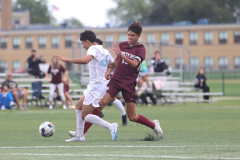Lockport’s Jackson Abdel-Razik tries to work the ball around a Solorio defender in the Windy City Classic at Revis High School in Burbank on Saturday, Aug. 26, 2023.