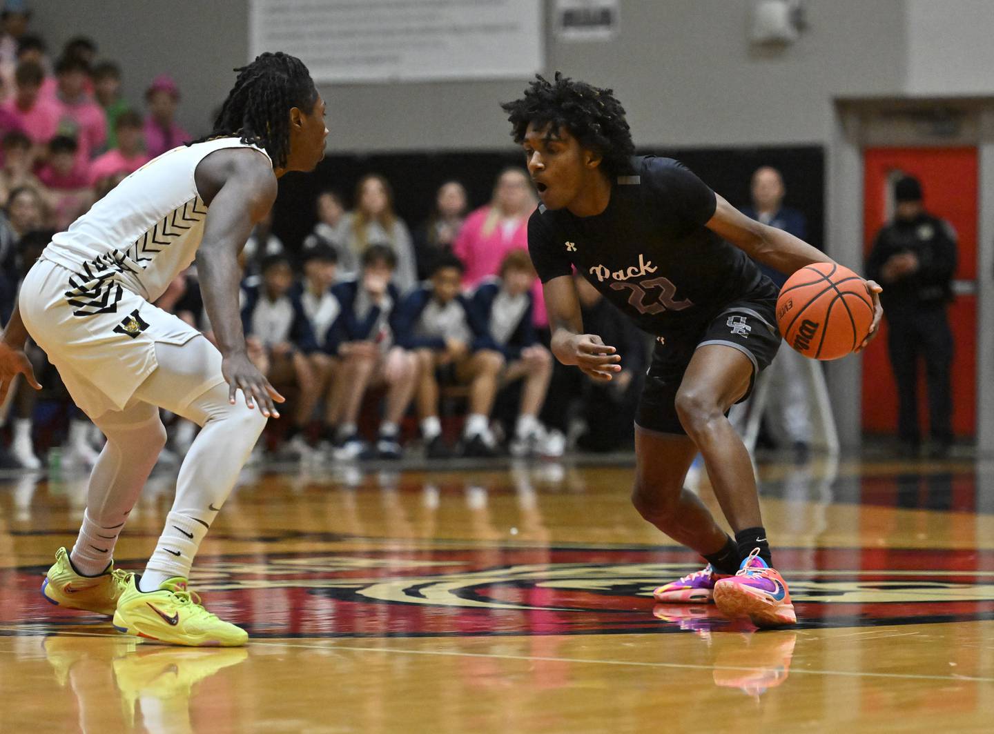 Oswego East's Jehvion Starwood tries to drive by Joliet West defender during the Class 4A Bolingbrook Sectional Championship on Friday, March. 03, 2023, at Bolingbrook.