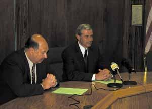 Shaw Local 2005 file photo – Sycamore School Board President Jim Dombek (left) announces the hiring of Wayne Riesen as the district's new superintendent at a news conference in 2005.