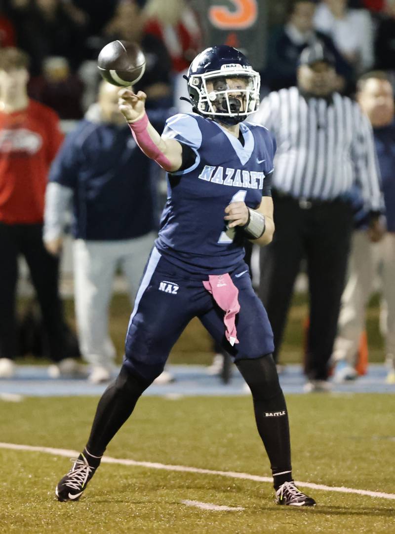 Nazareth's Logan Malachuk (1) throws during the varsity football game between Benet and Nazareth academies on Friday, Oct. 18, 2024 in La Grange Park.