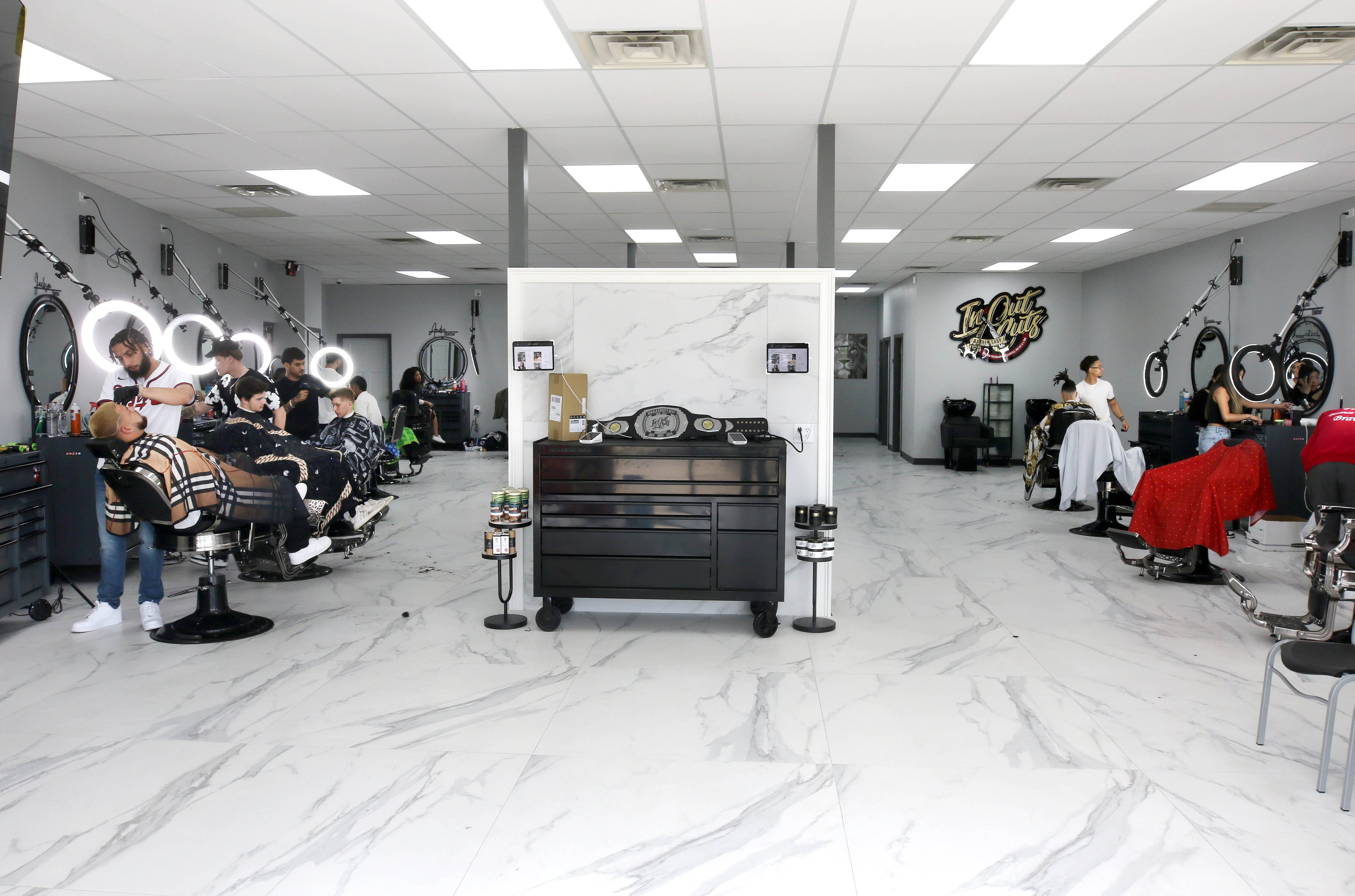 The interior of In & Out Cuts Barbershop, Friday, Aug 9, 2024, at the barbershop’s new location at 2331 Sycamore Road in DeKalb.